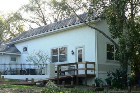 18' X 50' X 16' TIMBERCRAFT CUSTOM RV GARAGE ADDITION REAR VIEW WITH DECK EUSTIS, FL