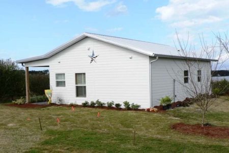 32' X 36' TIMBERCRAFT LAKEFRONT GUEST COTTAGE MT DORA, FL