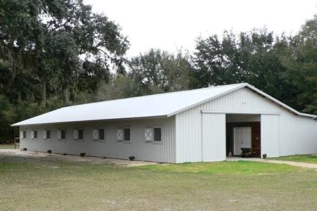 36' X 96' X 10' TIMBERCRAFT HORSE STABLE WITH 24' X 24' TACK ROOM HIGH SPRINGS, FL