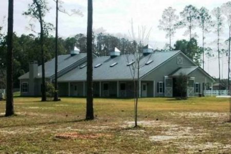 56' X 96' X 12' TIMBERCRAFT MULTI-PURPOSE GUEST HOUSE & EQUESTRIAN FACILITY REAR VIEW ORLANDO, FL